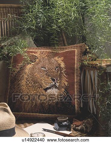 Close-up of lion motif cross-stitch cushion View Large Photo Image Stock Image - Close-up of lion motif cross-stitch cushion. Fotosearch