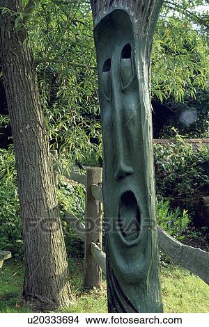 Picture - Close-up of modern sculpture in the garden. Fotosearch
