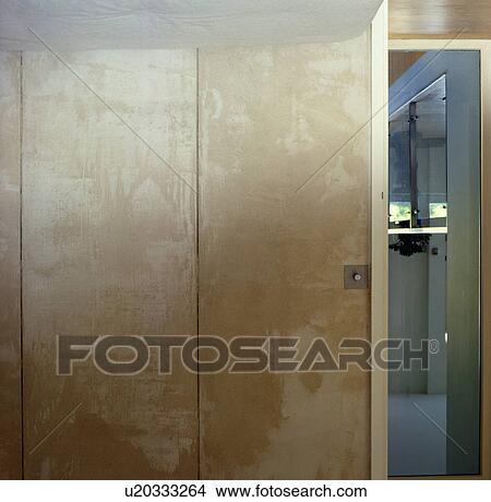 Picture - Close-up of modern storage cupboard doors. Fotosearch