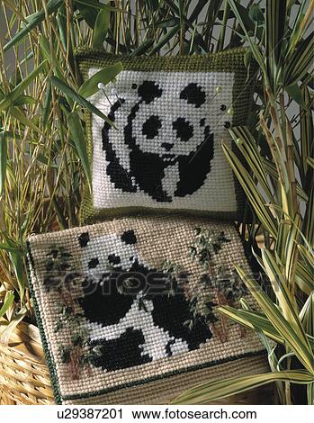 Close-up of panda motif cross-stitch cushions View Large Photo Image Stock Image - Close-up of panda motif cross-stitch cushions. Fotosearch