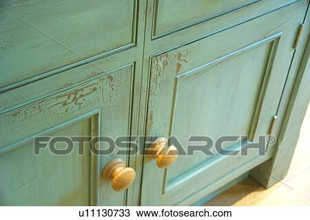 Close-up of pastel turquoise kitchen cupboard with distressed paint effect View Large Photo Image Stock Image - Close-up of pastel turquoise kitchen cupboard with distressed paint effect. Fotosearch