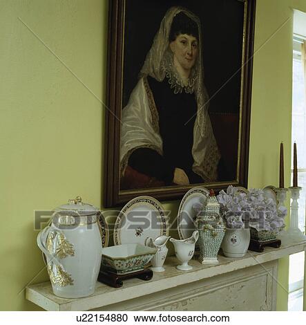 Close-up of picture above collection of china on mantelpiece View Large Photo Image Stock Image - Close-up of picture above collection of china on mantelpiece. Fotosearch