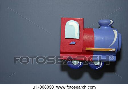 Close up of plastic toy train door handle on cupboard View Large Photo Image Stock Image - Close up of plastic toy train door handle on cupboard. Fotosearch