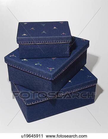 Close-up of set of 3 denim storage boxes decorated with floral motif View Large Photo Image Stock Image - Close-up of set of 3 denim storage boxes decorated with floral motif. Fotosearch