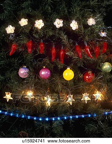 Stock Image - Close-up of sets of Christmas tree lights. Fotosearch