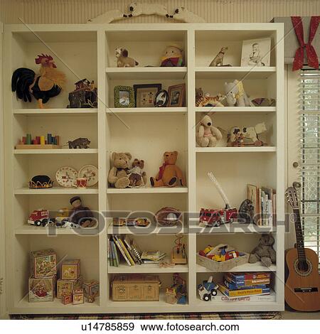 Close-up of soft toys and games on shelves View Large Photo Image Stock Photo - Close-up of soft toys and games on shelves. Fotosearch