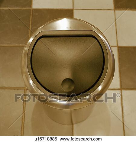 Stock Photography - Close-up of stainless steel Brabantia waste bin. Fotosearch