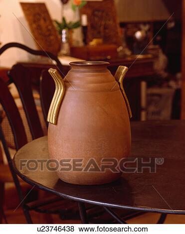 Stock Photo - Close-up of terracotta pot. Fotosearch