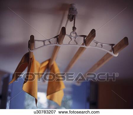 Stock Photo - Close-up of traditional pulley drying rack. Fotosearch