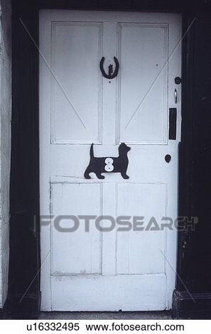 Close up of white front door with dog shaped letterbox View Large Photo Image Stock Photography - Close up of white front door with dog shaped letterbox. Fotosearch
