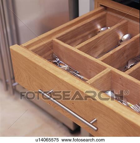 Close-up of wooden cutlery drawer View Large Photo Image Stock Photography - Close-up of wooden cutlery drawer. Fotosearch