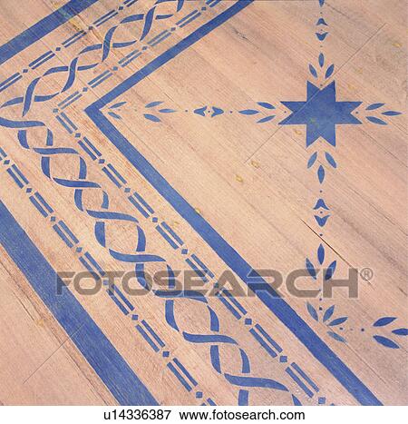 Stock Photo - Closeup of painted design on wood floor.. Fotosearch