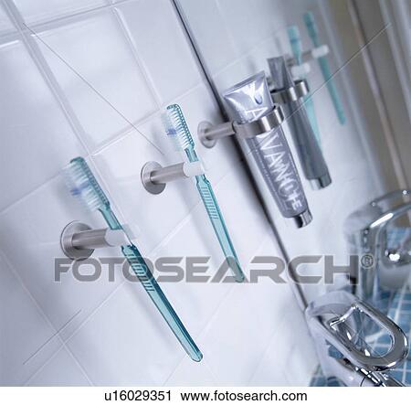 Stock Image - Closeup of toothbrush storage. Fotosearch