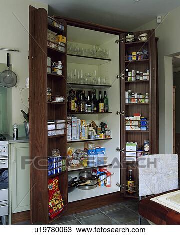 Contemporary wooden kitchen with open larder cupboard. View Large Photo Image Stock Image - Contemporary wooden kitchen with open larder cupboard.. Fotosearch