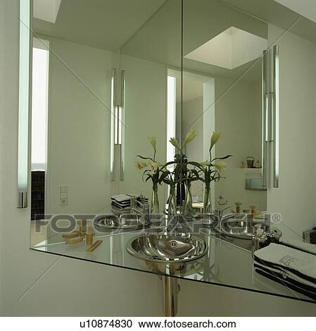 Corner stainless steel basin in mirrored bathroom View Large Photo Image Stock Image - Corner stainless steel basin in mirrored bathroom . Fotosearch