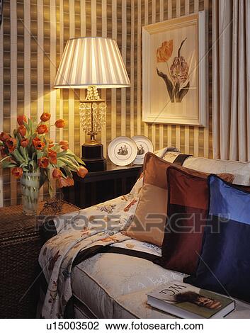 Stock Image - Cosy corner of interior designed livingroom.. Fotosearch