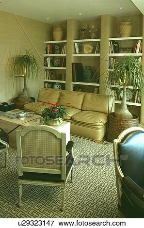 Cream leather sofa in traditional living room View Large Photo Image Stock Photo - Cream leather sofa in traditional living room. Fotosearch