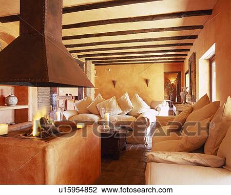 Cream sofas in Spanish country living room View Large Photo Image Stock Image - Cream sofas in Spanish country living room. Fotosearch