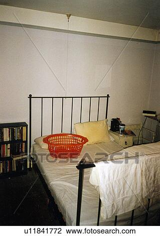 Stock Image - Dilapidated bedroom before renovation. Fotosearch