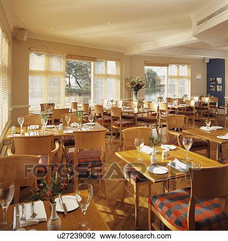 Dining room in hotel restaurant by the river View Large Photo Image Stock Image - Dining room in hotel restaurant by the river. Fotosearch