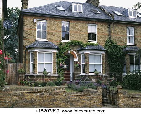 Double fronted semi detached Victorian townhouse with loft conversion View Large Photo Image Stock Photo - Double fronted semi detached Victorian townhouse with loft conversion. Fotosearch