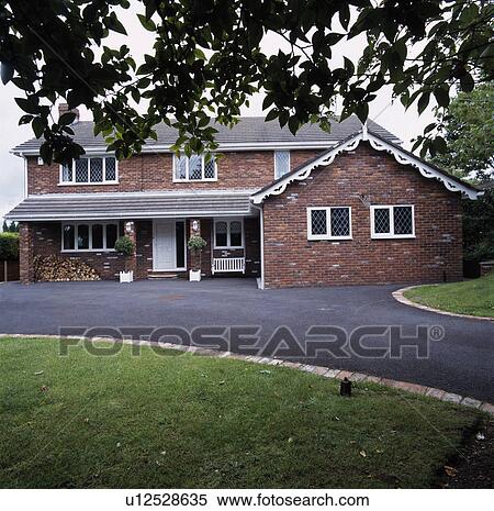 Drive in front of large brick eighties country house View Large Photo Image Stock Photography - Drive in front of large brick eighties country house. Fotosearch
