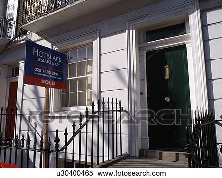 Estate Agents "For Sale" signboard in front of Victorian terraced townhouse View Large Photo Image Stock Photography - Estate Agents "For Sale" signboard in front of Victorian terraced townhouse. Fotosearch