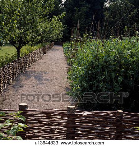 Fence in green country garden in summer View Large Photo Image Stock Image - Fence in green country garden in summer. Fotosearch