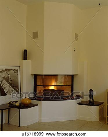 Stock Photo - Fireplace in modern living room. Fotosearch