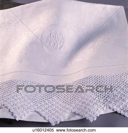 Stock Photography - Freshly laundered monogrammed linen.. Fotosearch