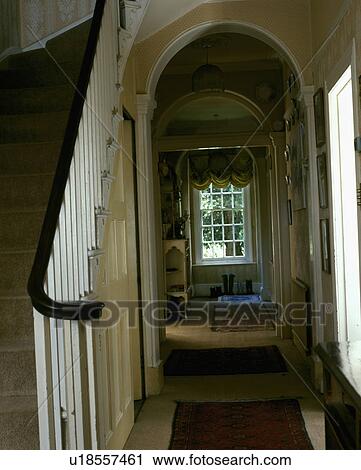 Hall in Georgian house with view to window overlooking the garden View Large Photo Image Stock Image - Hall in Georgian house with view to window overlooking the garden. Fotosearch