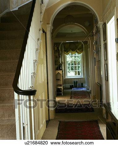 Hall in Georgian house with view to window overlooking the garden View Large Photo Image Stock Image - Hall in Georgian house with view to window overlooking the garden. Fotosearch