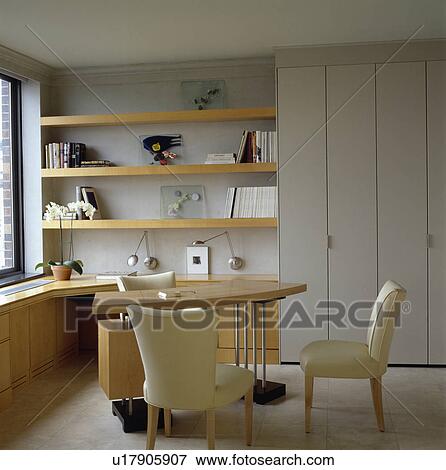 Stock Photo - Keep the files in the cupboards then this home office corner in your home will not be overpowering.. Fotosearch