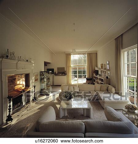 Large sofas in eighties-style country living room View Large Photo Image Stock Image - Large sofas in eighties-style country living room. Fotosearch