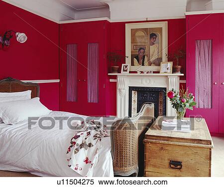 Large Traditional Pink Bedroom With Period Fireplace And Wardrobes