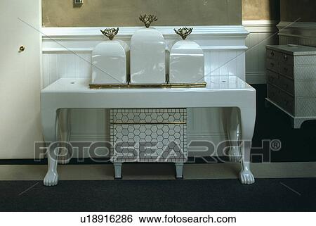 Large white ceramic boxes on white ceramic table in hall View Large Photo Image Stock Photograph - Large white ceramic boxes on white ceramic table in hall. Fotosearch
