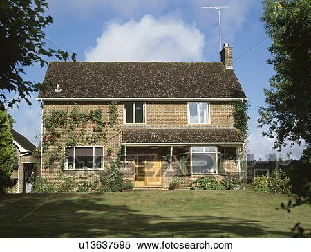 Lawn in front of detached sixties house in the country View Large Photo Image Stock Photography - Lawn in front of detached sixties house in the country. Fotosearch