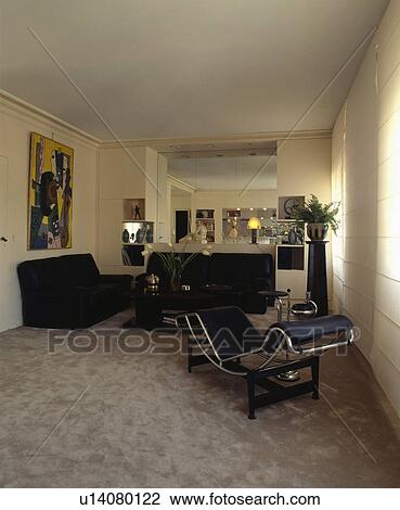 Le Corbusier chaiselongue in modern living room View Large Photo Image Stock Image - Le Corbusier chaiselongue in modern living room. Fotosearch