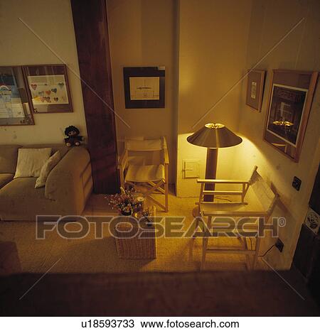 Lighted lamp in living room View Large Photo Image Stock Image - Lighted lamp in living room. Fotosearch