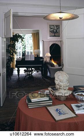 Lighting above table in traditional town living room View Large Photo Image Picture - Lighting above table in traditional town living room. Fotosearch