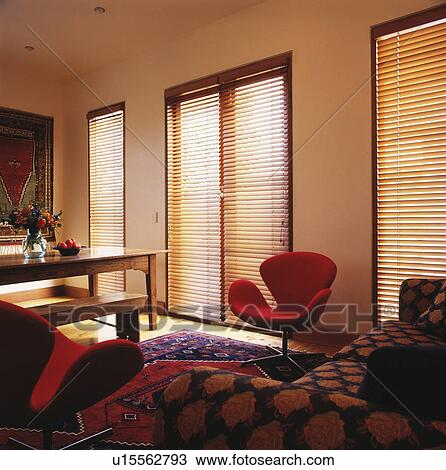 Stock Image - living dining room with red chairs. Fotosearch