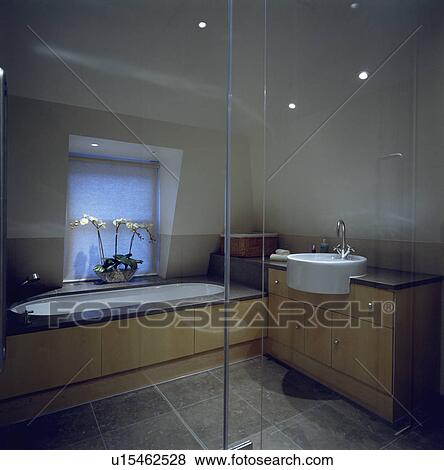 Modern bathroom with basin and bath. View Large Photo Image Stock Photo - Modern bathroom with basin and bath.. Fotosearch