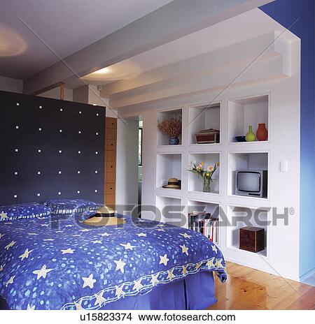 Modern Bedroom with Square Shelf Storage. View Large Photo Image Picture - Modern Bedroom with Square Shelf Storage.. Fotosearch