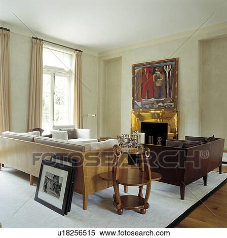 Modern designer furniture in white living room View Large Photo Image Stock Photography - Modern designer furniture in white living room. Fotosearch
