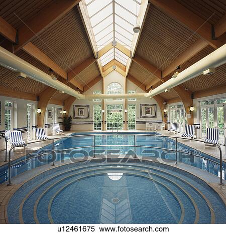 Modern indoor swimming pool View Large Photo Image Stock Photography - Modern indoor swimming pool. Fotosearch
