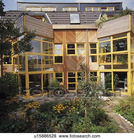 Stock Photo - Modern townhouse with small front garden. Fotosearch