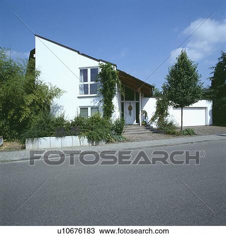 Stock Image - Modern white house in the country. Fotosearch