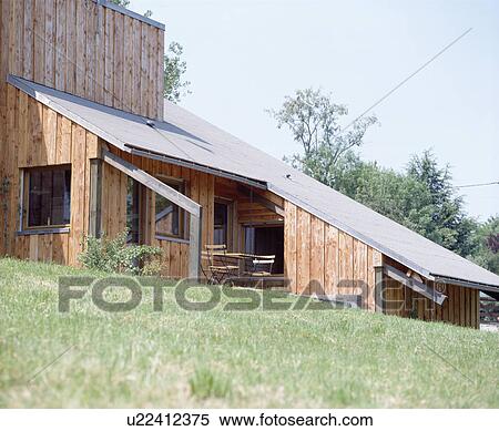 Modern wooden house in the country View Large Photo Image Stock Photography - Modern wooden house in the country. Fotosearch