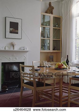 Modern Wooden Table And Chairs In Traditional Townhouse Diningroom