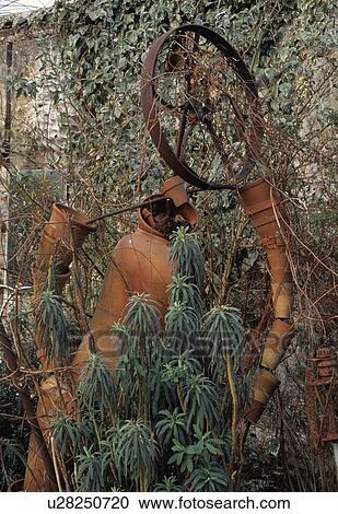 Stock Image - Novelty sculpture in country garden. Fotosearch